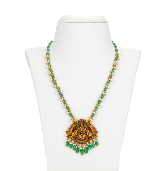 Resonant Gold Laxmi Devi Emerald Stone Necklace