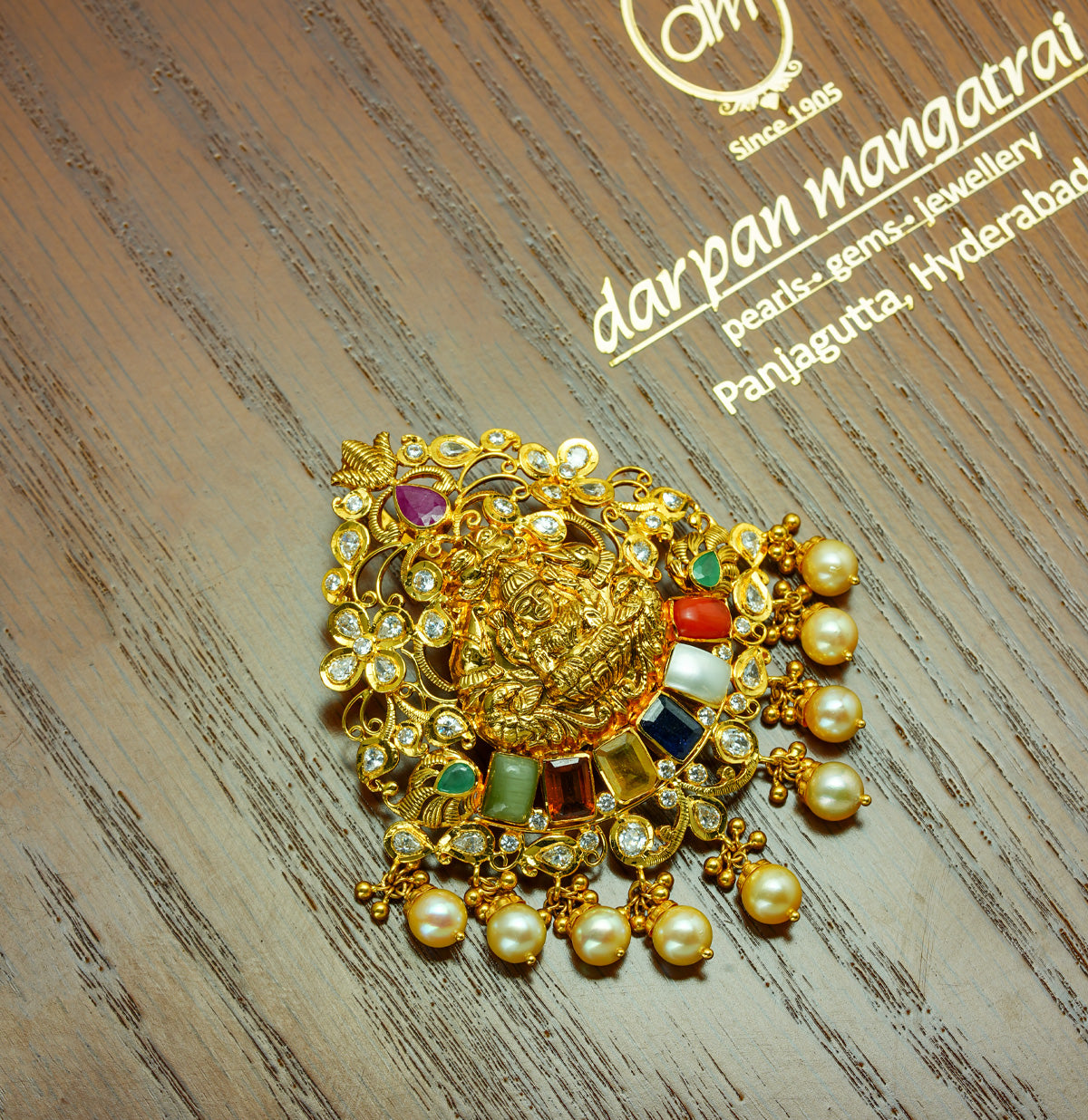 Decorative Laxmi Devi Gold Navratan Locket