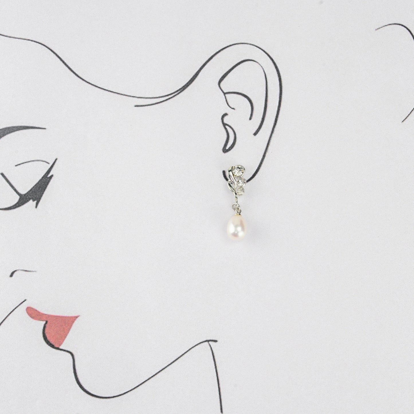 Silken White Drop Stud Earrings