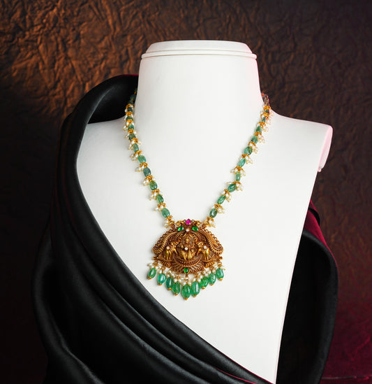 Resonant Laxmi Devi Emerald Gold Necklace