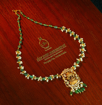 Gleaming Laxmi Devi Gold Emerald Necklace