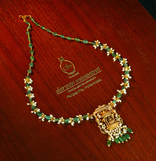 Gleaming Laxmi Devi Gold Emerald Necklace