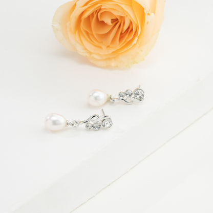 Silken White Drop Stud Earrings