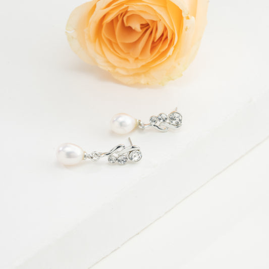 Silken White Drop Stud Earrings