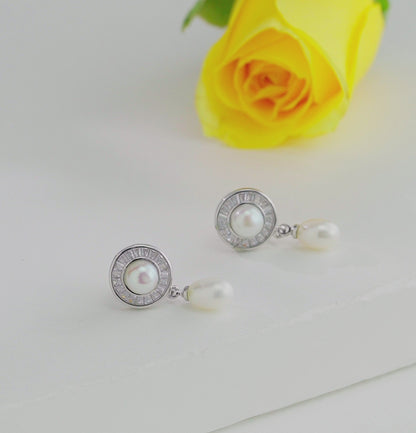 Seized White Pearl Stud Earrings