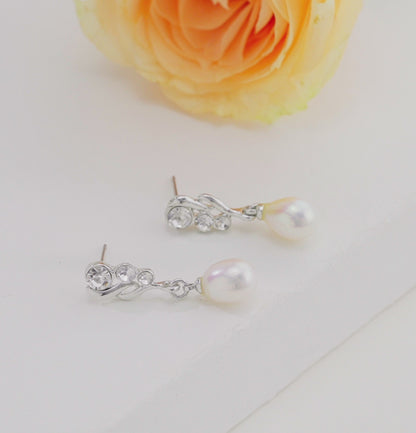 Silken White Drop Stud Earrings