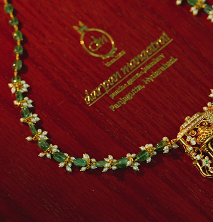 Gleaming Laxmi Devi Gold Emerald Necklace